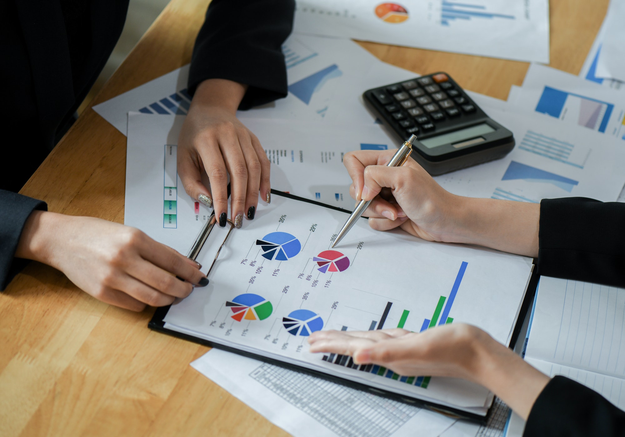 female-accountant-team-is-analyzing-data-to-present-the-client-.jpg female-accountant-team-is-analyzing-data-to-present-the-client-.jpg